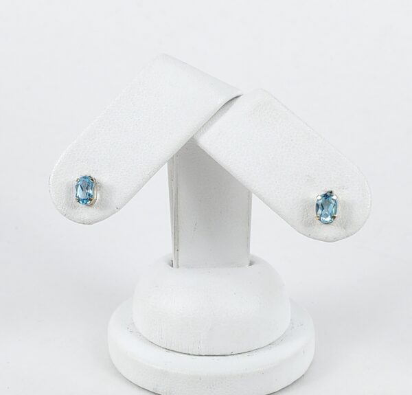 10k Yellow Gold .90ctw Oval Cut Blue Topaz Stud Earrings - Image 3